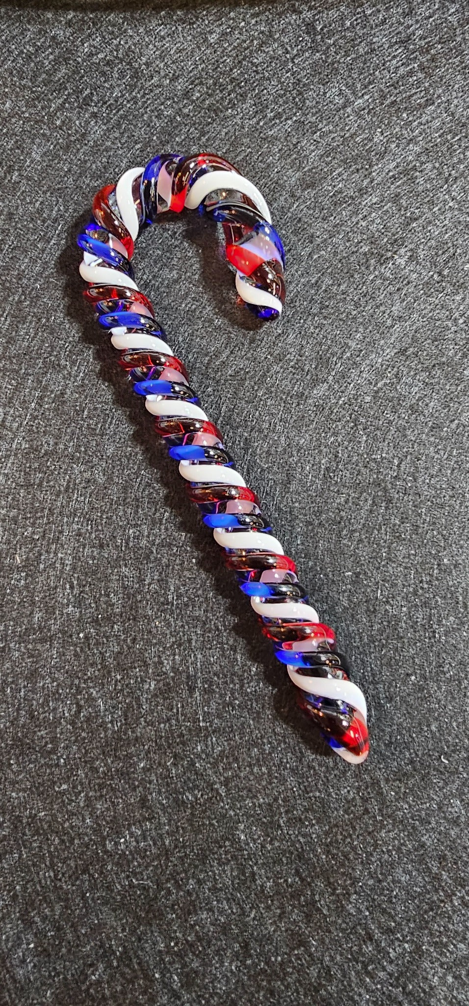 Members-only handmade glass candy cane ornament