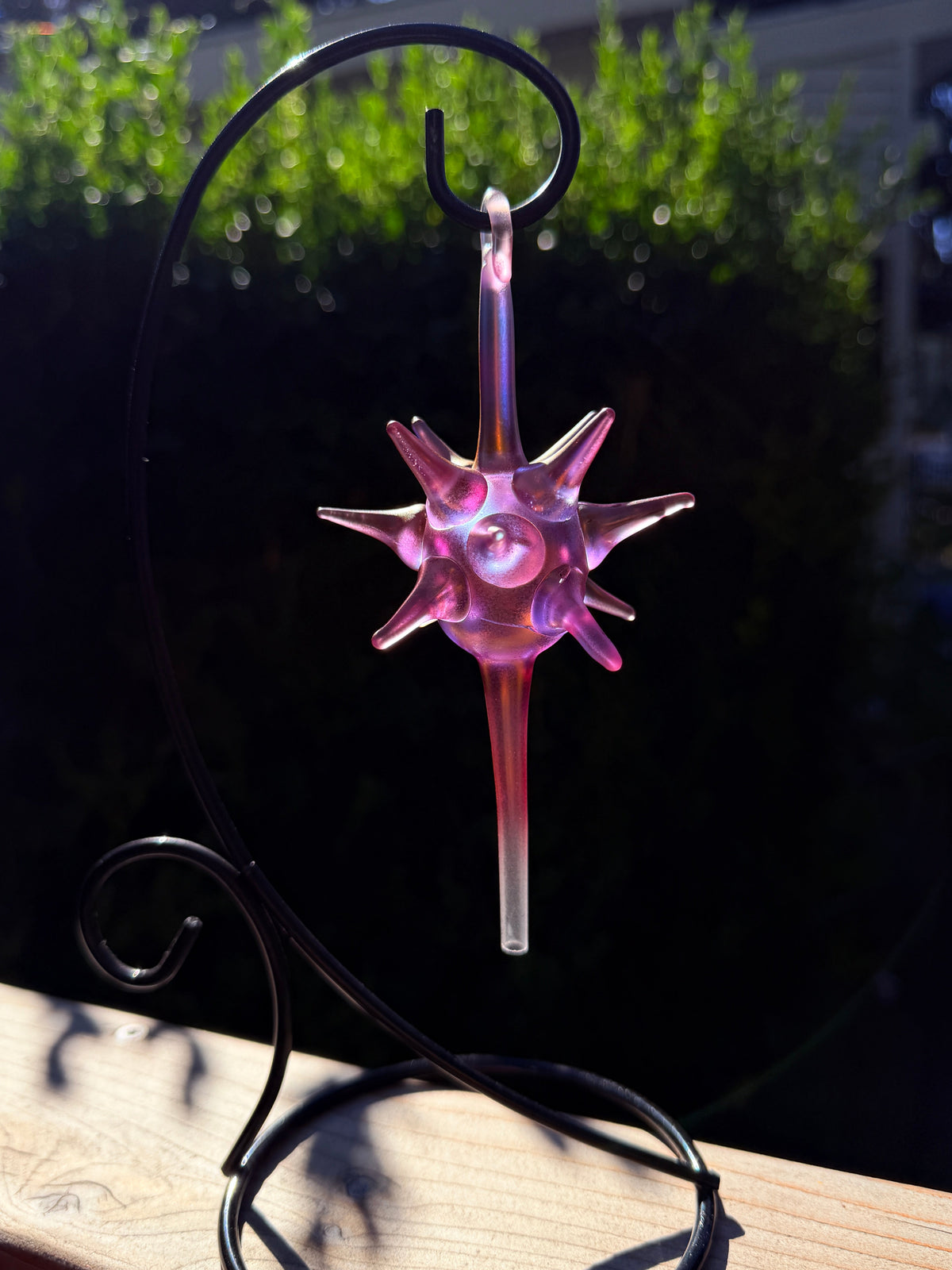 Gold Fume Starburst glass ornament with pink-purple finish