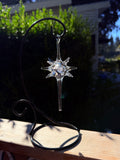 Starburst glass ornament in clear glass